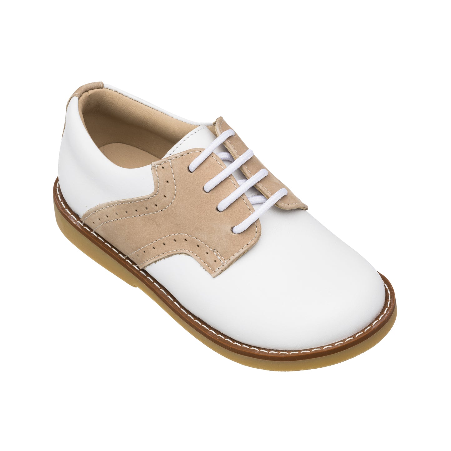 White and ivory children's leather shoe with beige suede overlay and white laces.
