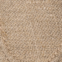 Beige woven jute espadrille with detailed stitching on natural fiber sole.