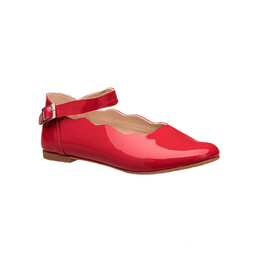 Red patent leather toddler flat with scalloped edge and ankle strap buckle closure.