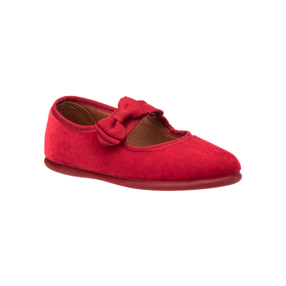 Red velvet Mary Jane shoe for toddlers with a decorative velvet bow and rounded toe.