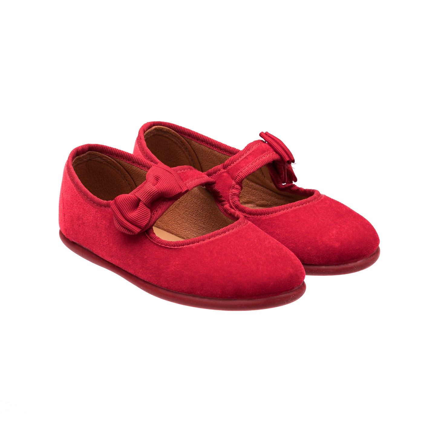 Red velvet Mary Jane shoes with a bow detail and rounded toe for toddlers.