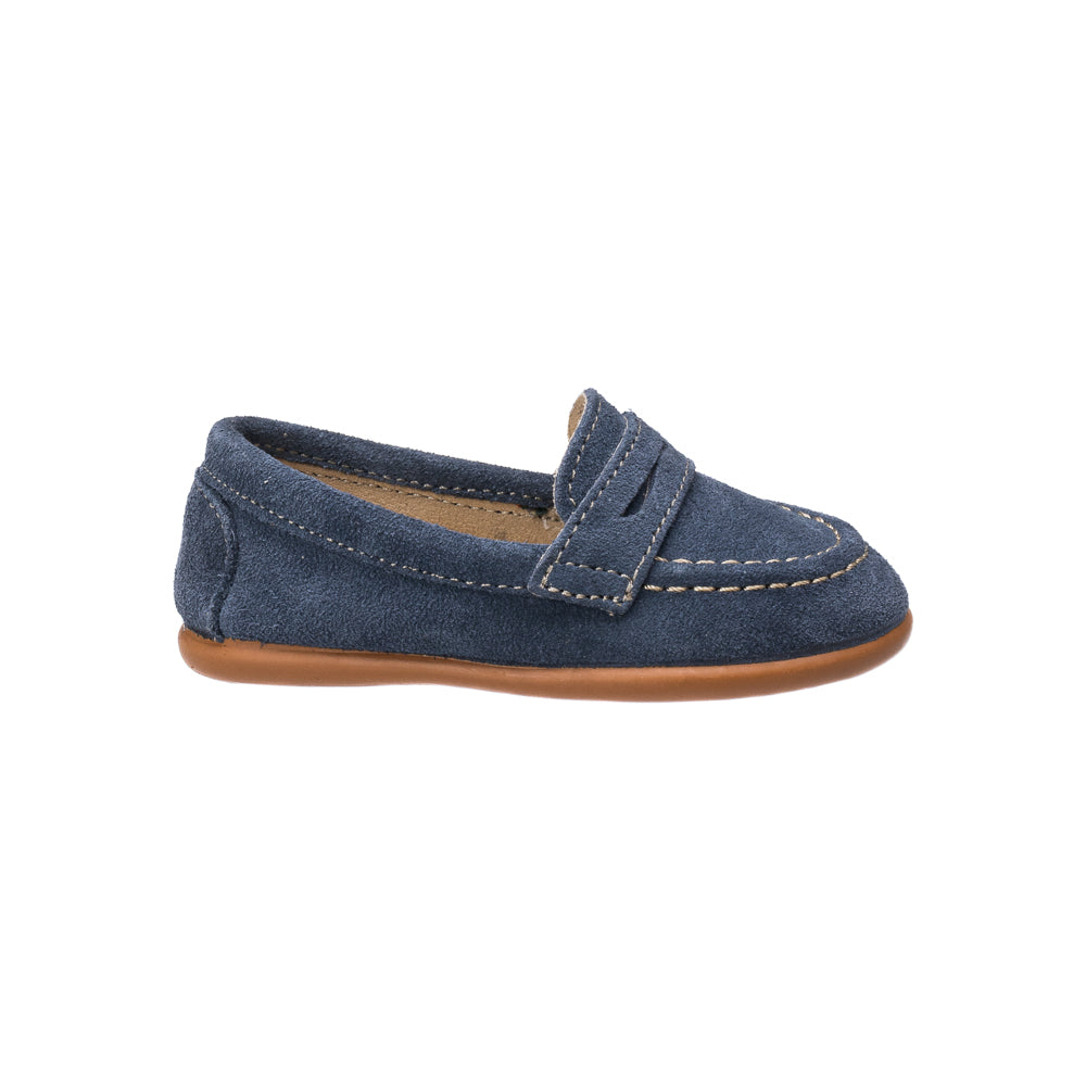 Blue suede penny loafer with stitched detailing and tan rubber sole for toddlers.
