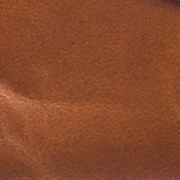 Natural brown soft leather baby moccasin with smooth texture and rounded toe.
