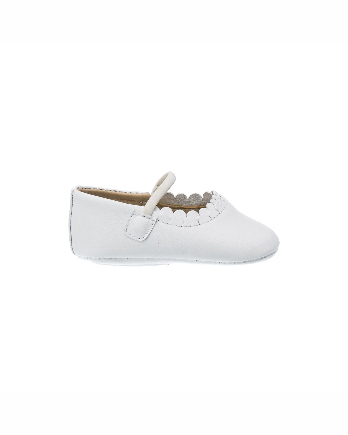 White baby ballet flat with scalloped edge trim and single strap closure.