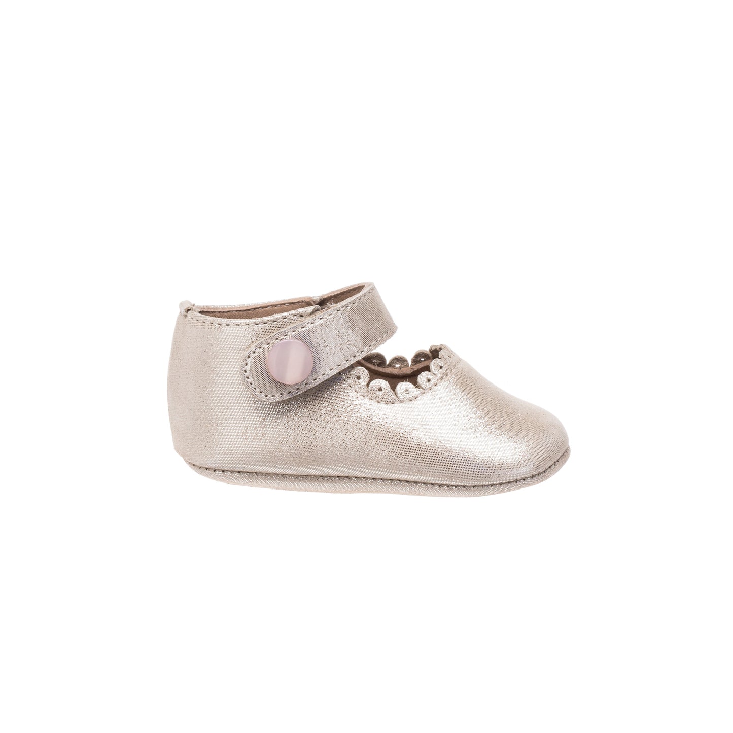 Soft pink baby Mary Jane shoe with scalloped edge and buttoned strap closure.