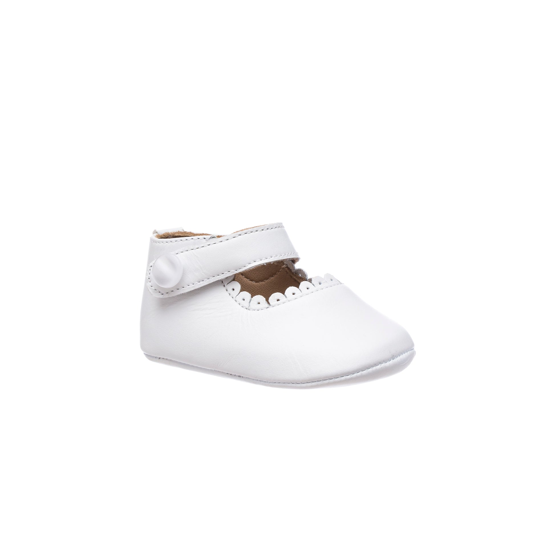 White baby Mary Jane shoe with scalloped edge and velcro strap closure.