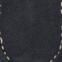 Navy blue toddler moccasin with cream whipstitch detailing on suede upper.