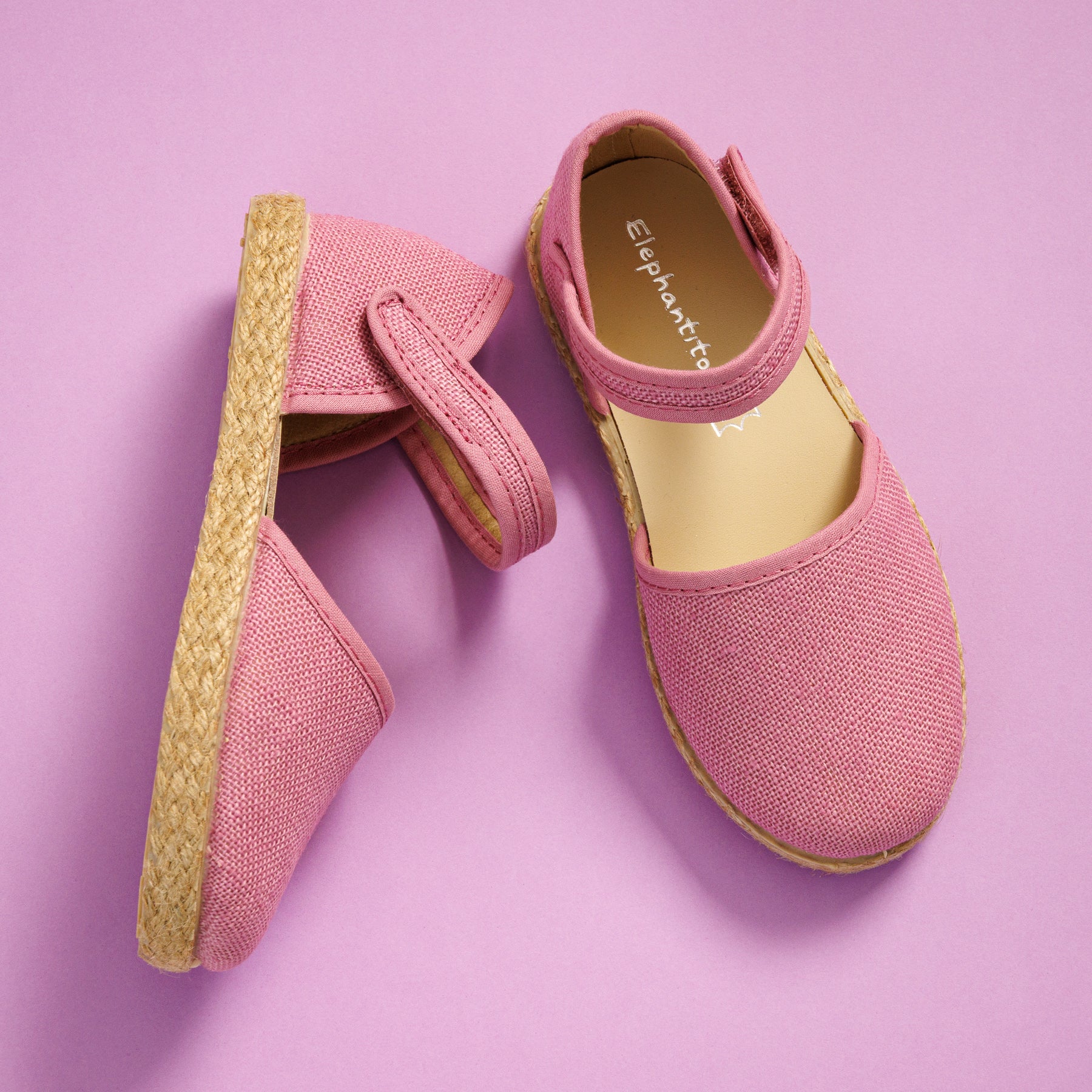 Elephantito - Mauve linen espadrille sandals for girls with ankle strap and jute sole on pink background.