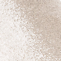 Close-up of textured pale beige Mary Jane shoe with subtle shimmer and fine mesh fabric.