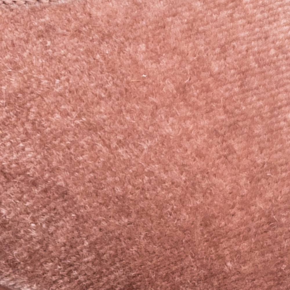 Soft pink velvet fabric with a plush, textured surface for children's shoes.