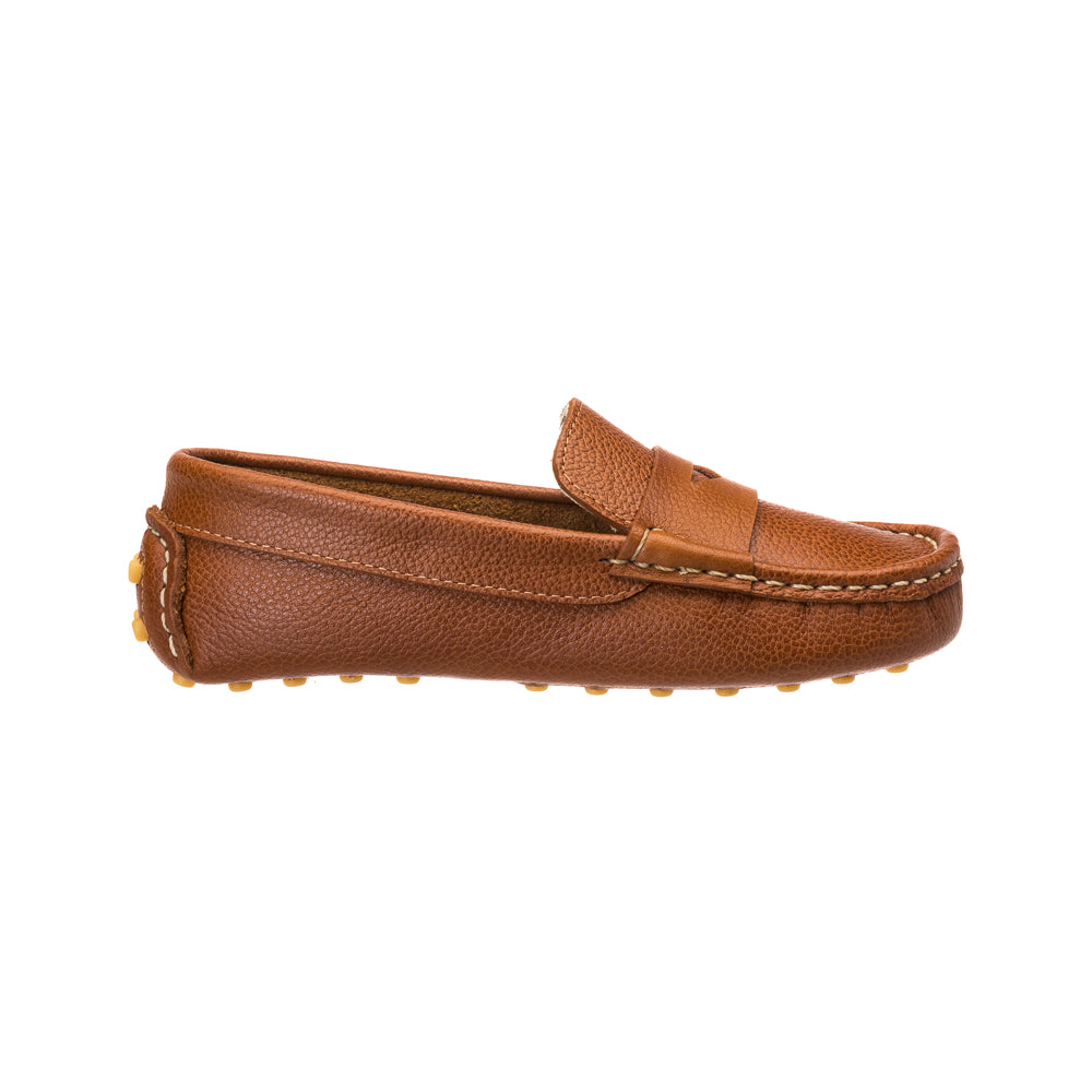 Tan leather driver loafer for children with stitched moc toe and rubber pebble outsole.