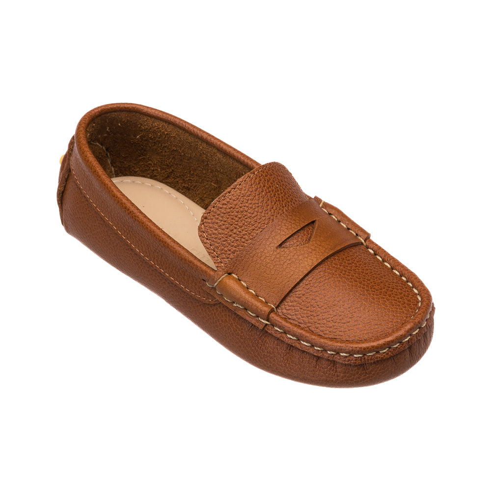 Tan leather children’s driver loafer with moccasin toe and penny slot detail.