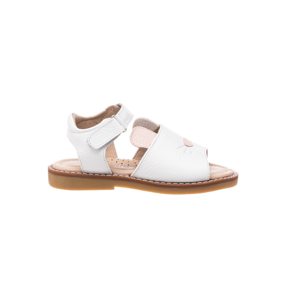 White toddler sandal with open toe, bunny ear detail, and velcro ankle strap.