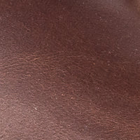 Smooth Apache brown leather texture with subtle natural grain details.