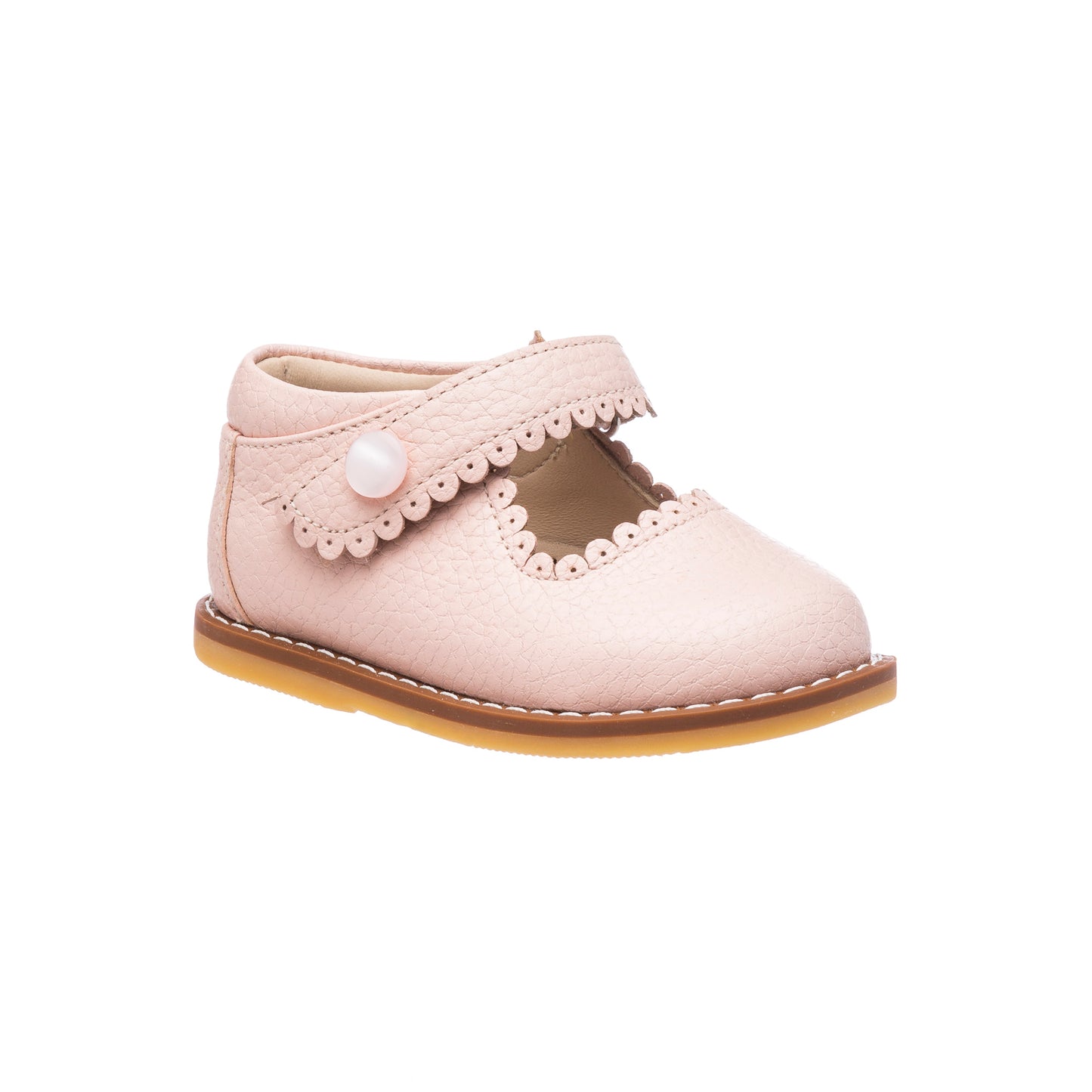 Pink toddler Mary Jane shoe with scalloped strap and button detail, tan sole.