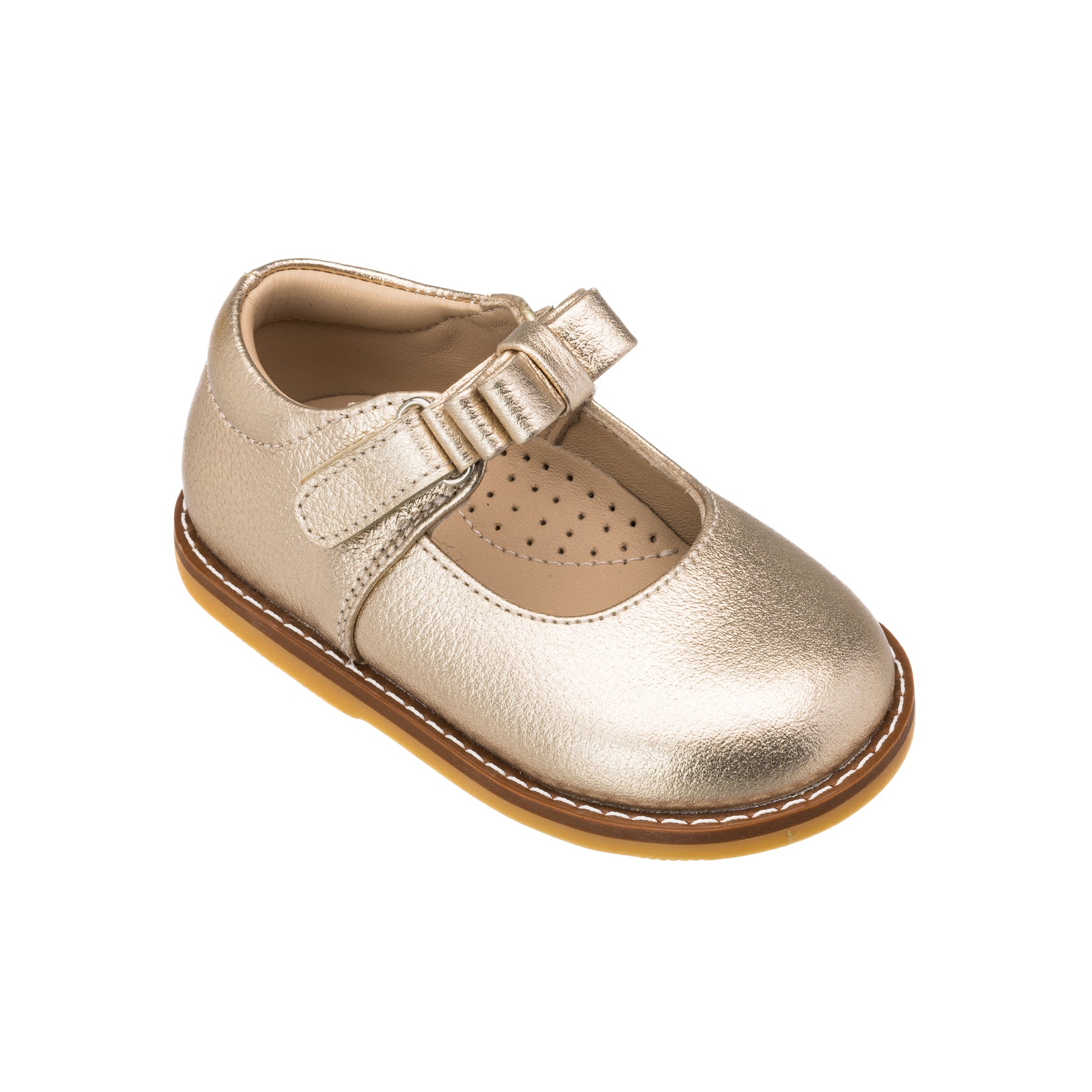 Gold metallic toddler Mary Jane shoe with perforated insole and side Velcro strap bow.