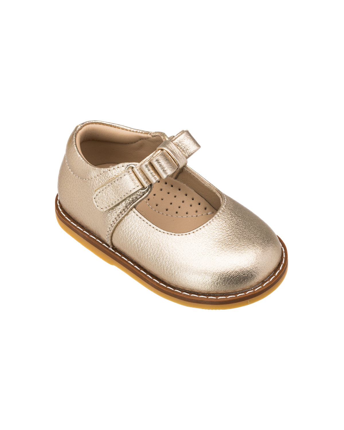 Gold metallic toddler Mary Jane shoe with bow detail and adjustable strap on brown sole.
