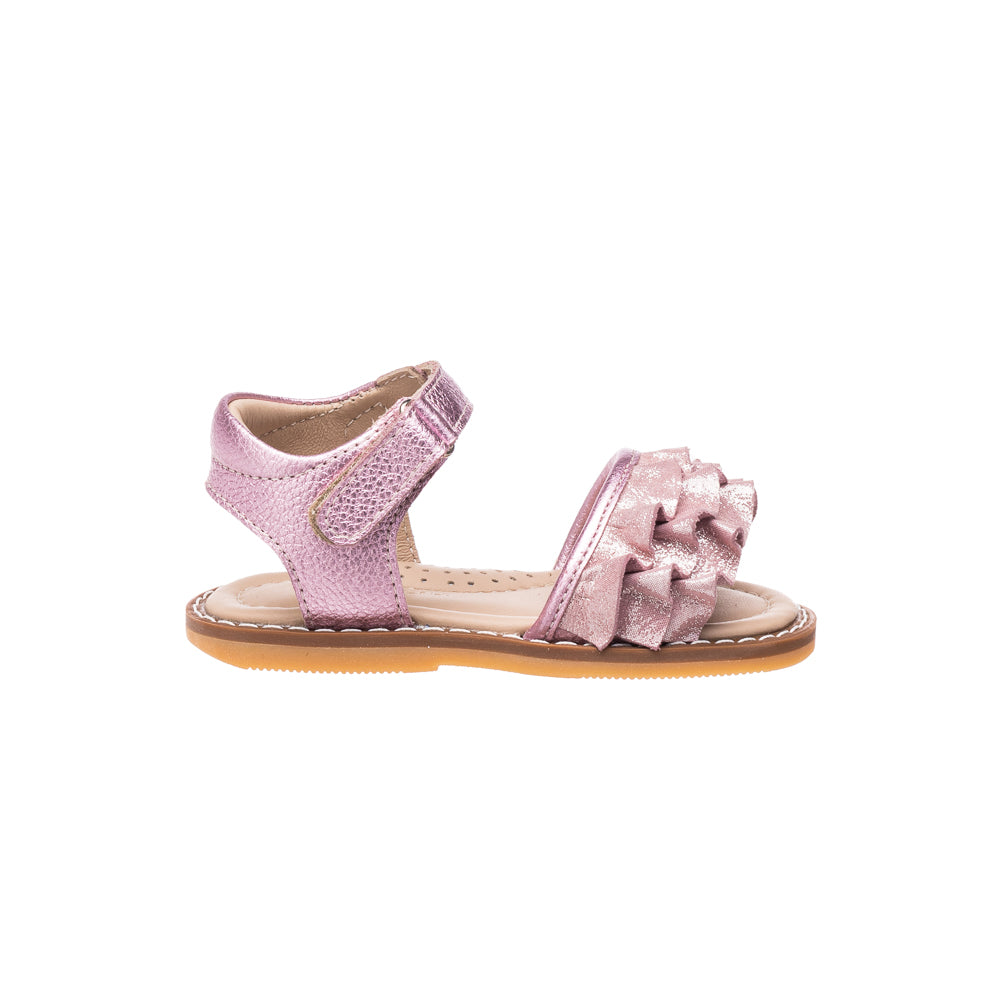 Toddler sandal in shimmery carnation pink with ruffled front strap and Velcro ankle closure.