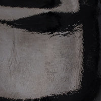 Black patent leather toddler flats with rounded toes and a glossy finish.