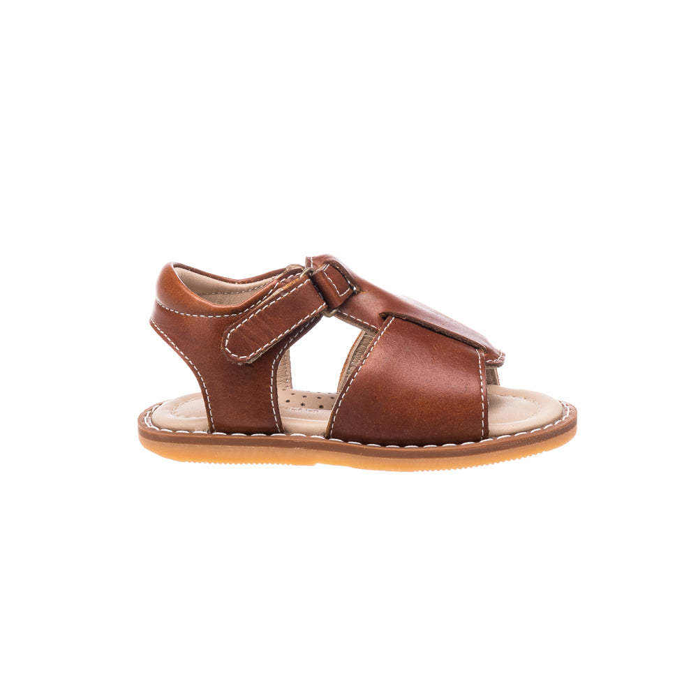 Brown leather toddler sandal with adjustable strap and cushioned sole.