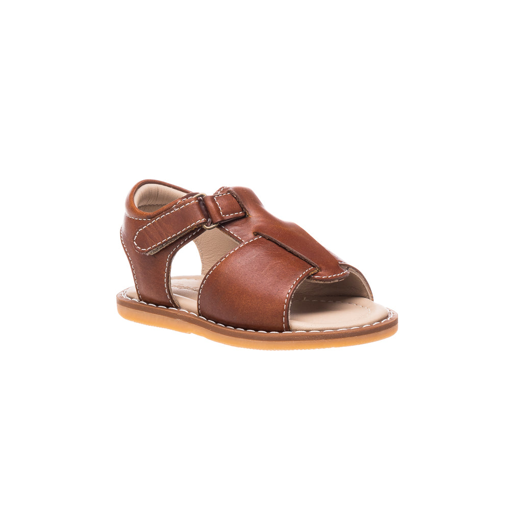 Toddler boy sandal in natural brown leather with adjustable velcro strap and cushioned sole.