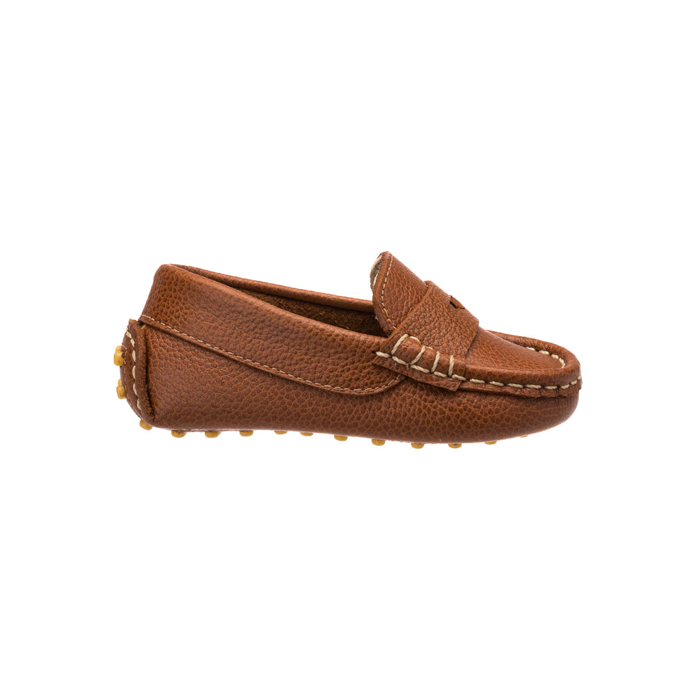 Tan leather toddler loafer with stitched moc toe and rubber pebble sole.