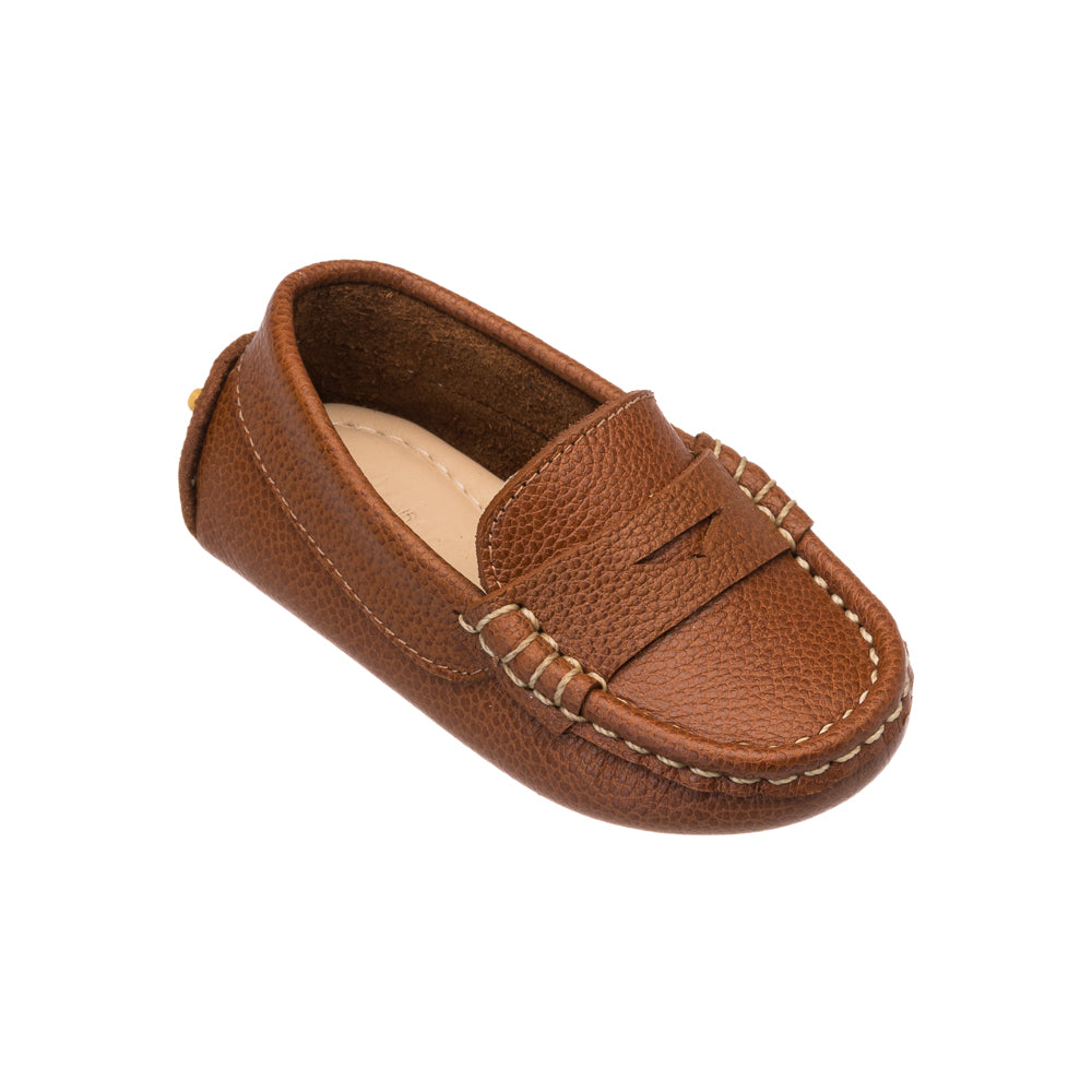 Tan leather toddler loafer with moccasin stitching and penny slot detail.