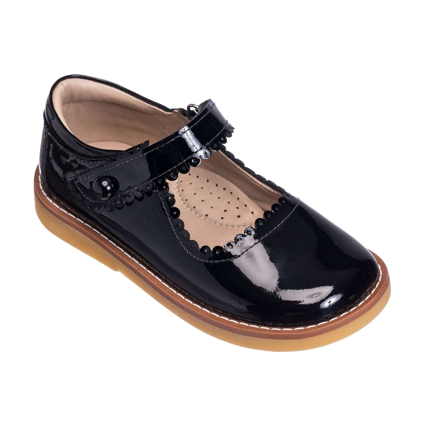 Black patent leather toddler Mary Jane shoe with scalloped edges and tan sole.