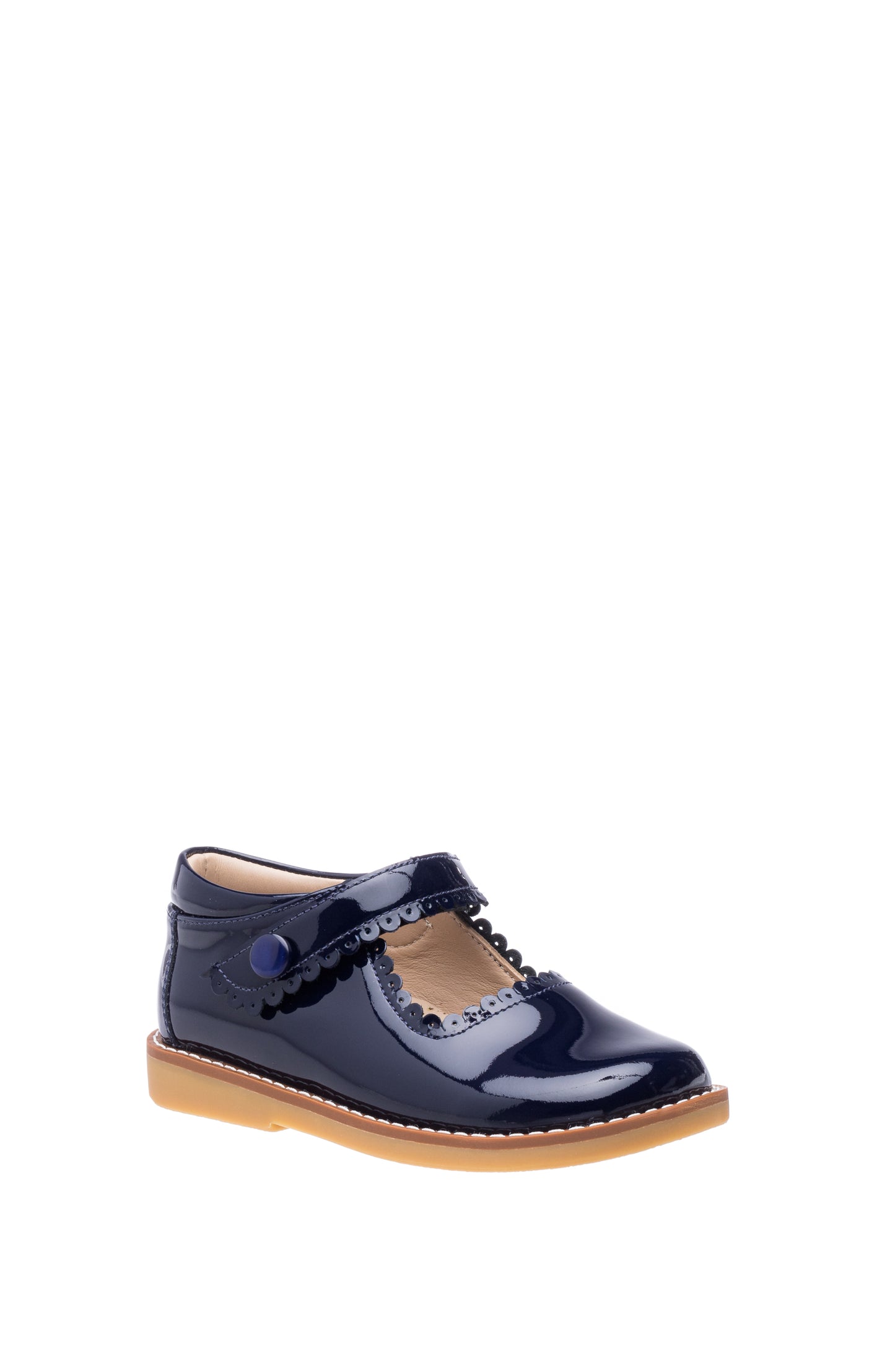 Navy blue patent leather Mary Jane shoe with scalloped edges and brown sole.