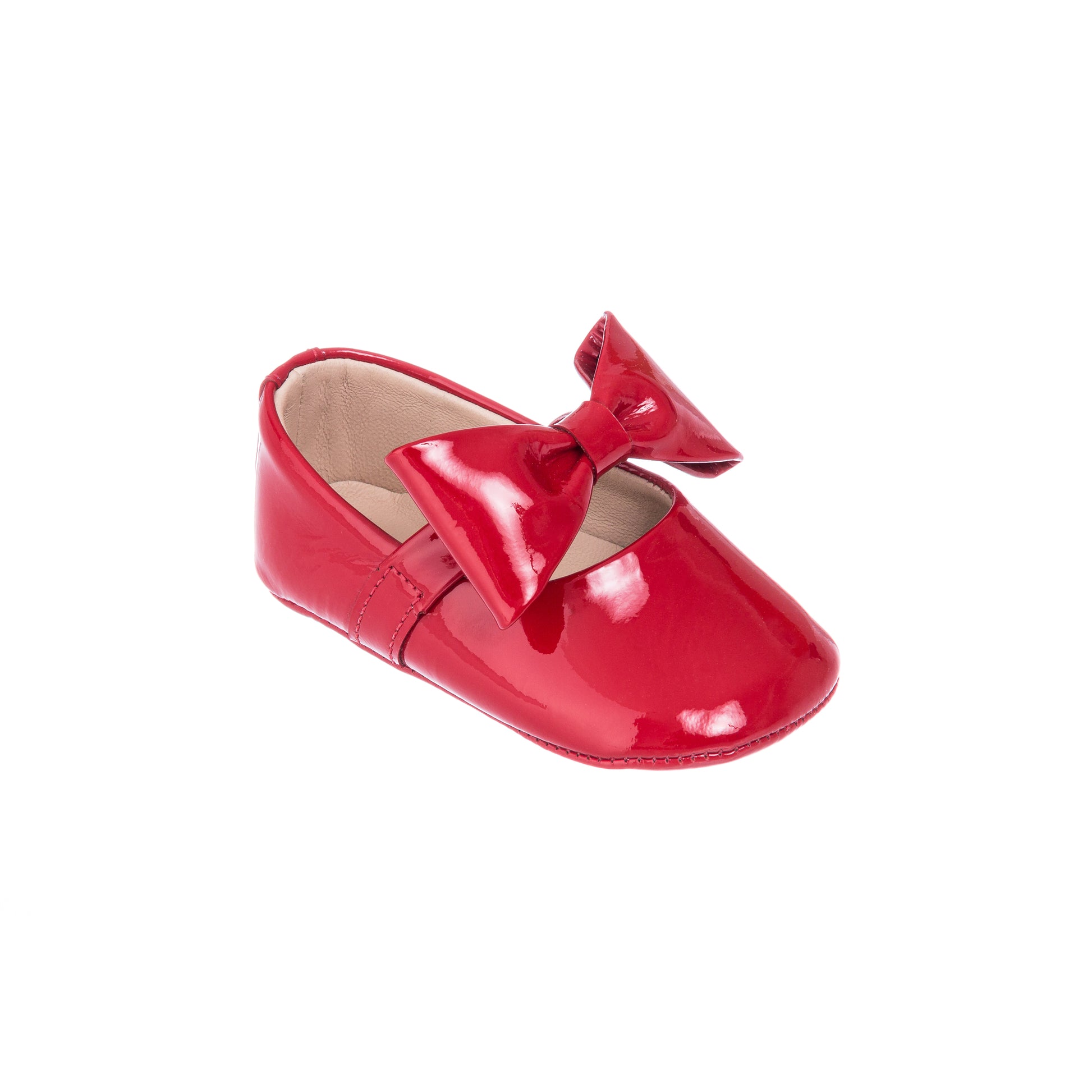 Glossy red patent leather baby ballerina shoe with large matching bow on top.