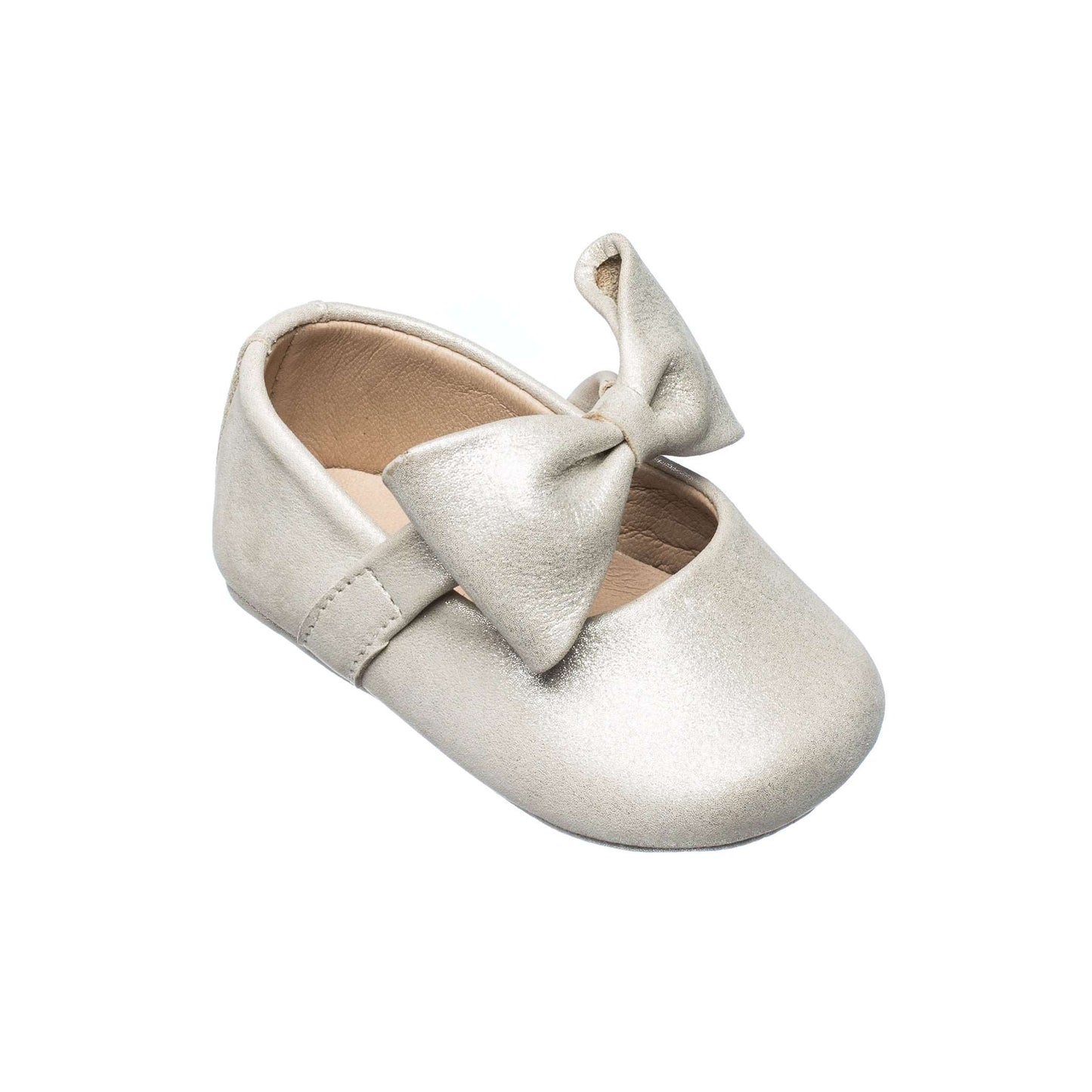 Soft metallic silver baby shoe with large decorative bow and elastic strap.