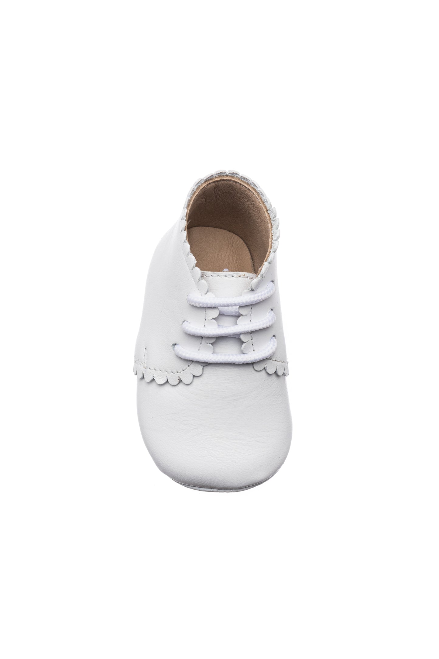 White leather baby bootie with scalloped edges and two bow accents on the front.