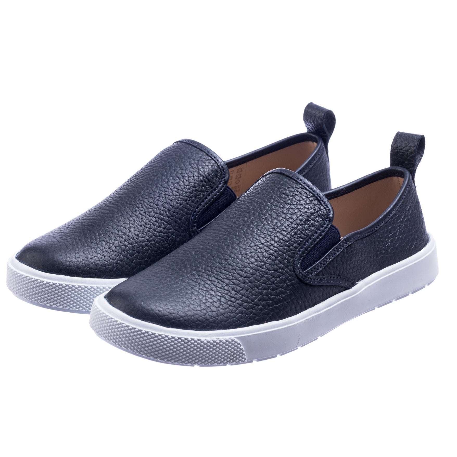 Textured navy blue slip-on children's shoes with white rubber soles and heel pull tabs.