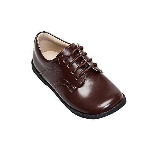 Toddler brown leather dress shoe with brogue detailing and black sole.