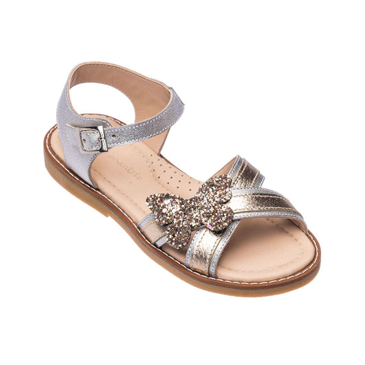 Toddler girl's metallic silver sandal with glittery butterfly and ankle strap buckle closure.