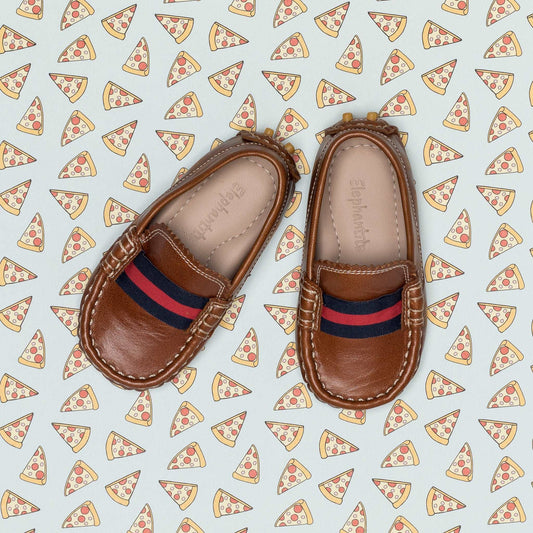 Natural brown toddler loafers with red and navy striped fabric detail and stitched edges.