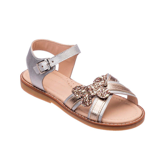 Toddler sandal with silver crossed straps and glittery butterfly embellishment, buckle closure.
