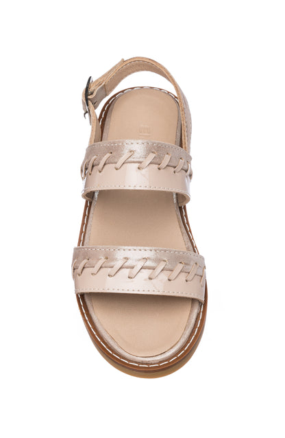 Blush pink girls sandal with double stitched straps and adjustable ankle buckle.