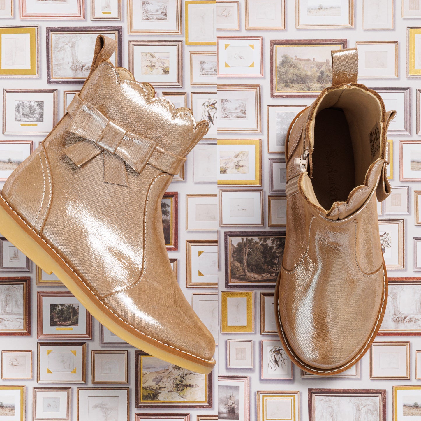 Shiny blush pink toddler booties with scalloped edges and decorative bow on side.