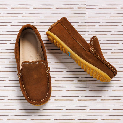 Chestnut brown suede moccasin loafers with contrasting white stitching and yellow rubber soles for toddlers.