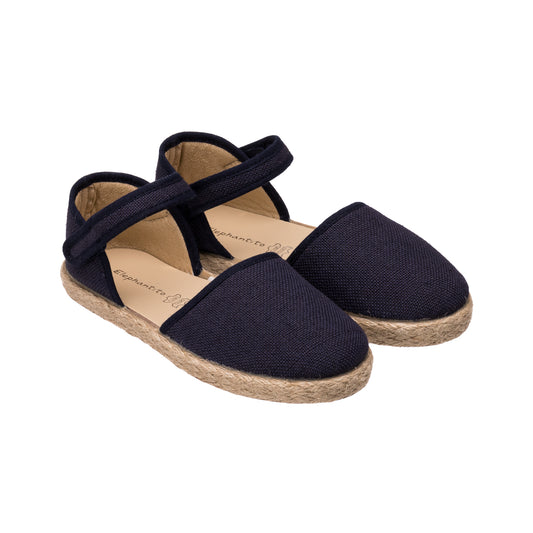 Navy linen espadrille with jute sole and adjustable velcro strap for toddlers and kids.