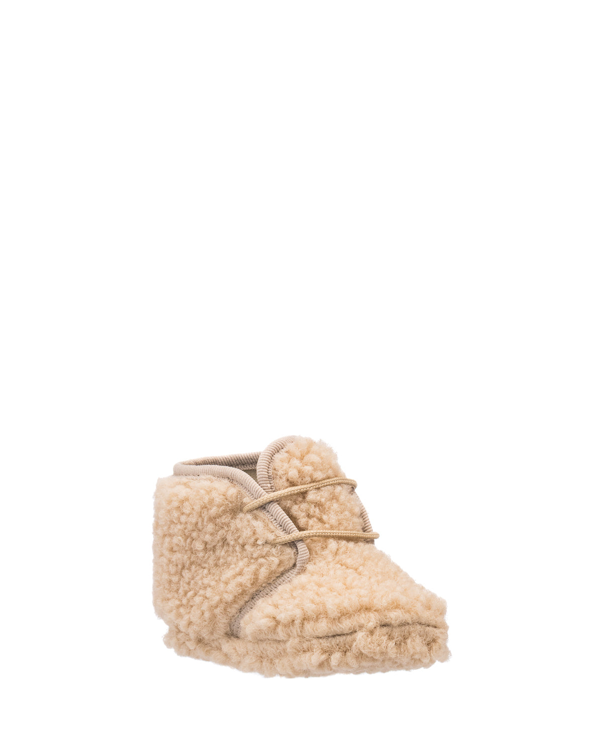 Beige shearling baby bootie with soft, fluffy texture and lace-up front closure.