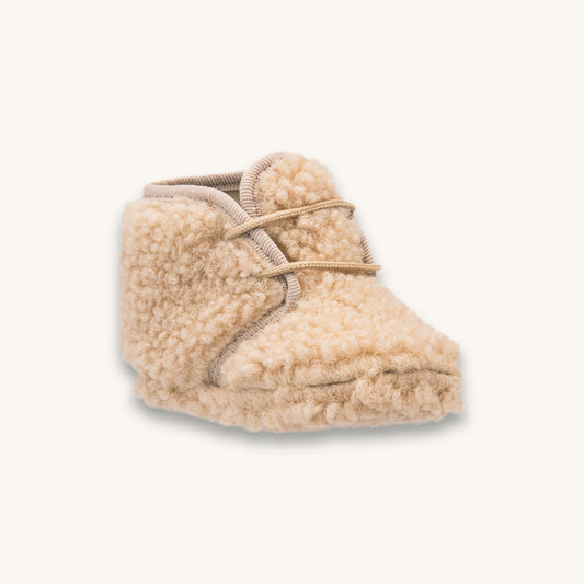 Chaussons bébé en peau lainée beige