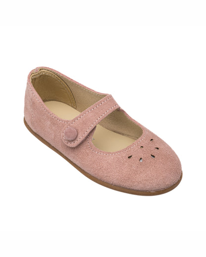 Rose pink suede Mary Jane shoe with button strap and perforated floral design on toe.