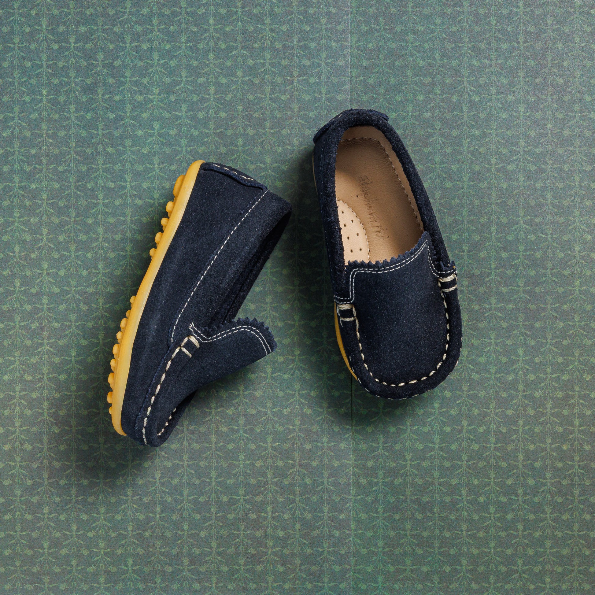 Toddlers' blue suede moccasin-style driver shoes with stitched detailing and rubber soles.