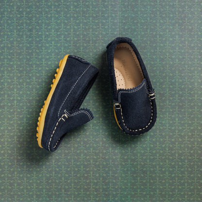 Toddlers' blue suede moccasin-style driver shoes with stitched detailing and rubber soles.