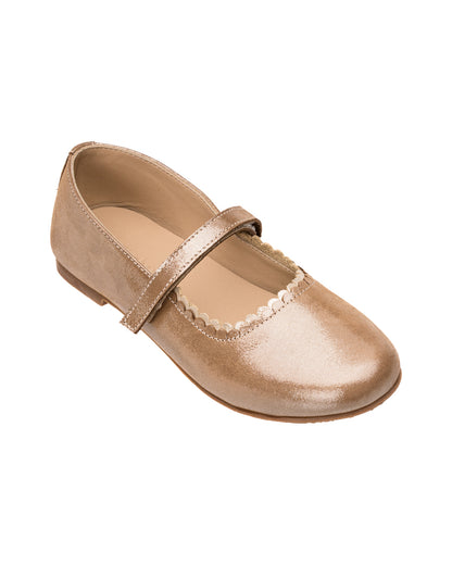 Blush pink toddler flat shoe with Mary Jane strap and scalloped edge trim.