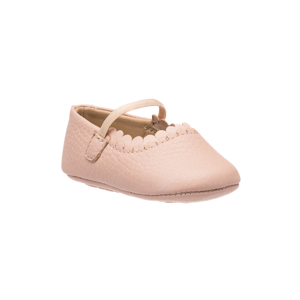 Soft pink leather baby shoe with scalloped edge trim and single strap closure.