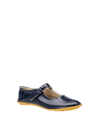 Navy blue patent leather girls Mary Jane shoe with velcro strap and tan rubber sole.