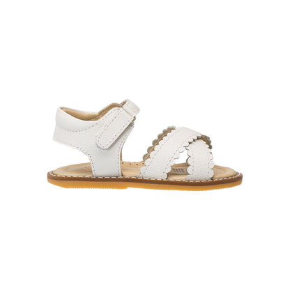 Elephantito - White toddler sandal with scalloped straps and Velcro ankle closure on brown sole.